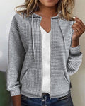 Textured zip-up hoodie in gray, front view