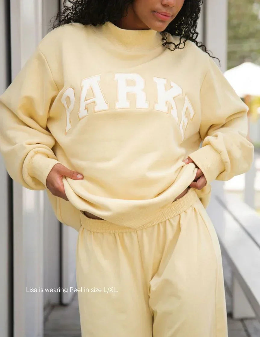Varsity chenille sweatshirt, pastel yellow with white letters