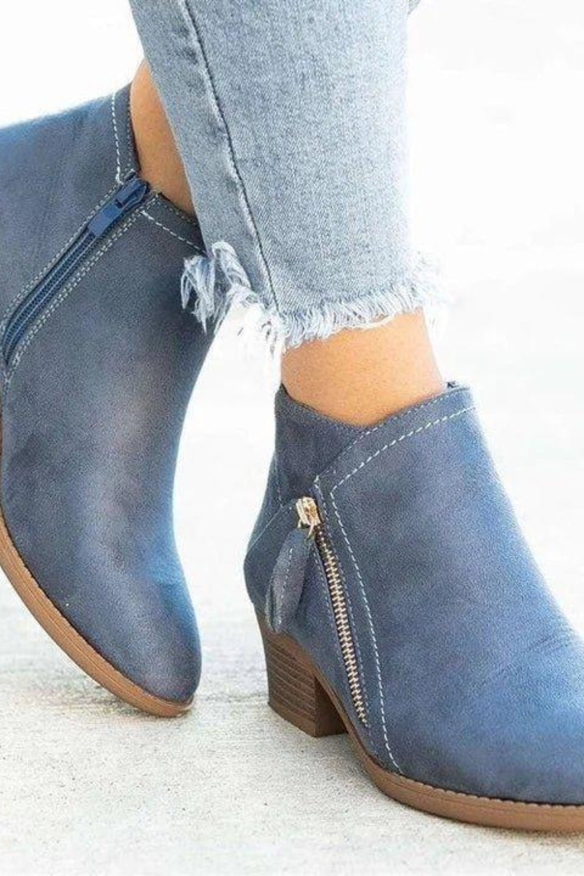 Western side zip ankle boots in blue, front view