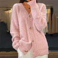 Cable knit pearl button cardigan in pink, front view