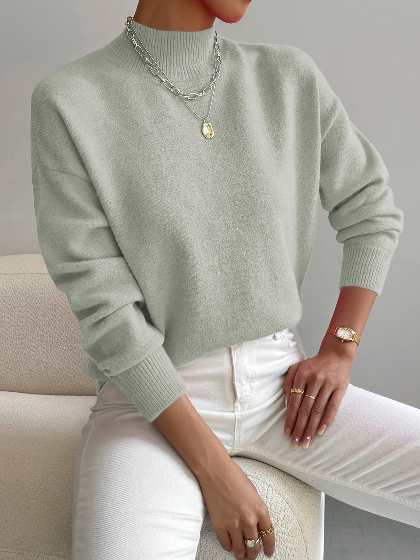 Soft knit turtleneck sweater in light green, front view