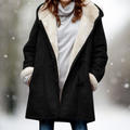 Toggle closure oversized coat in black, front view