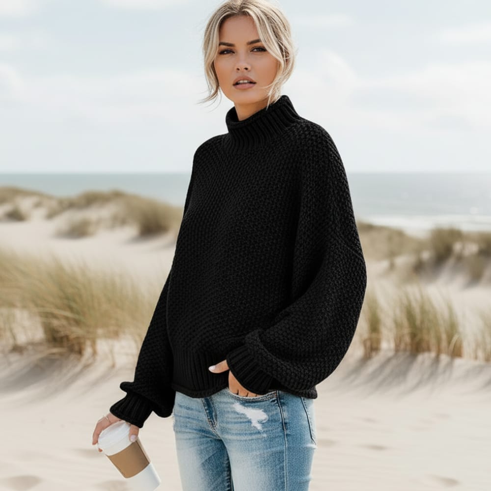 Loose fit turtleneck pullover sweater in black, front view
