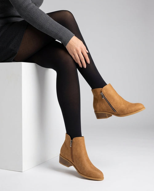 Curved topline block heel ankle boots in brown, front view