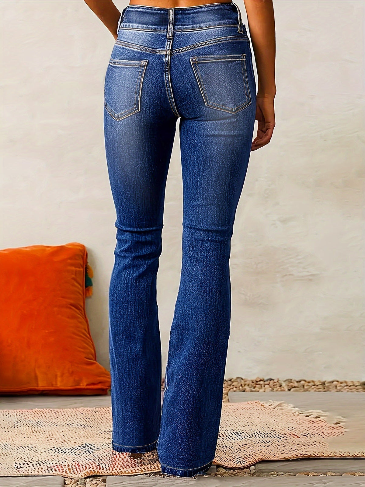 High-waisted flared pants, styled view