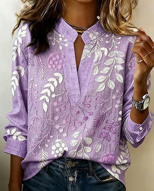 Floral V-neck blouse in purple, front view