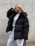 Hooded zip front puffer jacket in black, front view