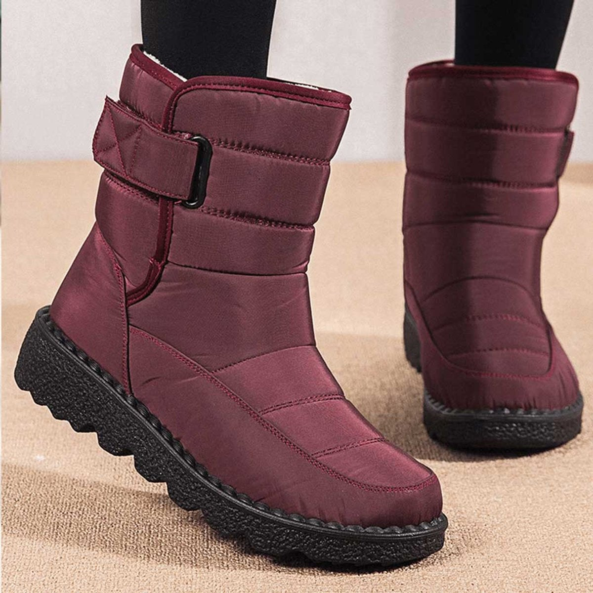 Quilted mid-calf snow boots in red, front view